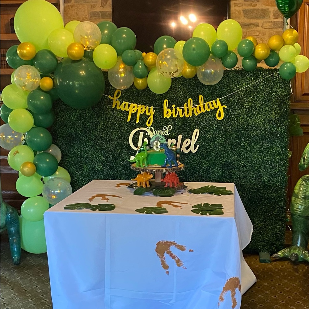 Custom-painted dino footsteps table cloth